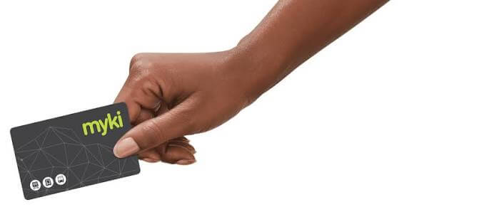 Hand holding a myki card — Melbourne Metro